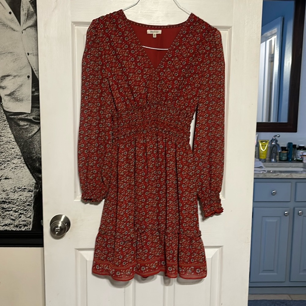 Women’s medium long sleeve red floral dress.
